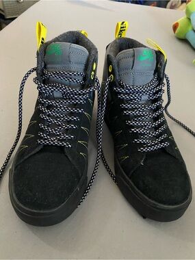 Black Suede High-Top Sneakers with Yellow and Green Accents